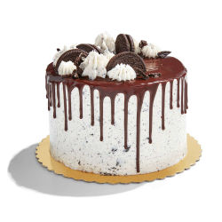 Prime Luxury Rentals - Creme Cookie Ganache Cake: Six inch